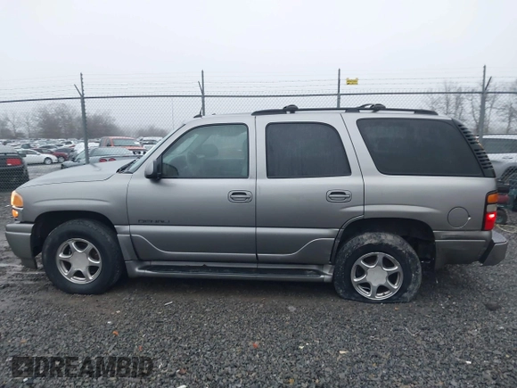 2005 GMC Yukon Denali z VIN 1GKEK63U25J228296, wystawiony jako IAAI lot #40980307 z przebiegiem 192 353 mil mil oraz . Historia ofert i sprzedaży dostępna na DreamBid. Obrazek 14.