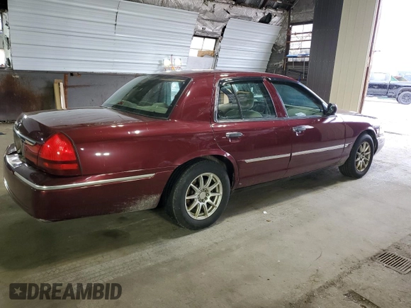 2004 Mercury Grand Marquis GS with VIN 2MEFM74W24X627374, listed as a Copart auction lot 50508605 with 118,635 mi miles and Salvage Title. Bid and sale history available at DreamBid. Image 3.