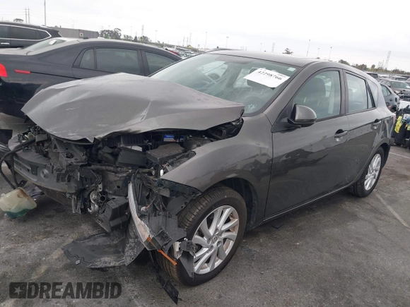 2012 Mazda 3 i Grand Touring z VIN JM1BL1M8XC1672751, wystawiony jako IAAI lot #42298766 z przebiegiem 129 056 mil mil oraz . Historia ofert i sprzedaży dostępna na DreamBid. Obrazek 2.