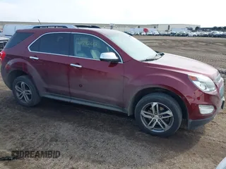 2016 Chevrolet Equinox LTZ z VIN 2GNFLGE35G6180761, wystawiony jako IAAI lot #41792662 z przebiegiem 95 628 mil mil oraz . Historia ofert i sprzedaży dostępna na DreamBid. Obrazek 1.