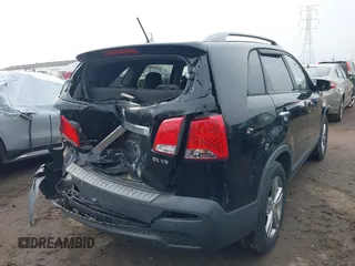 2012 Kia Sorento EX with VIN 5XYKUDA21CG285102, listed as a IAAI auction lot 41749176 with 154,034 mi miles. Bid and sale history available at carsss.com. Image 4.