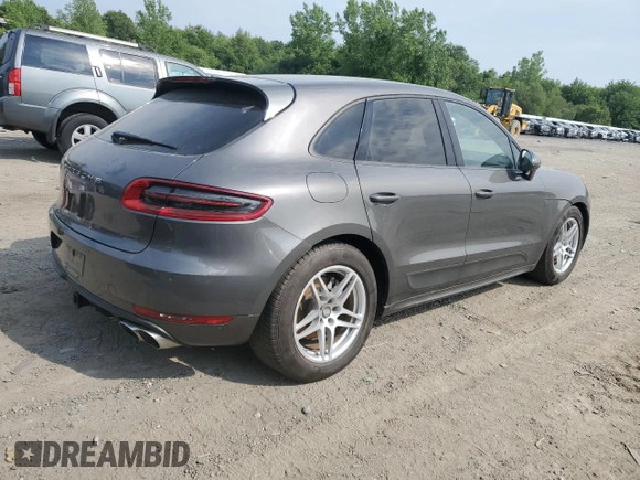 2015 Porsche Macan S with VIN WP1AB2A50FLB69249, listed as a Copart auction lot 60865995 with 128,659 mi miles and Salvage title. Bid and sale history available at DreamBid. Image 3.