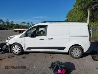 2020 Ford Transit Connect XLT with VIN NM0LS7F20L1476477, listed as a IAAI auction lot 41210937 with 41,598 mi miles and . Bid and sale history available at DreamBid. Image 14.