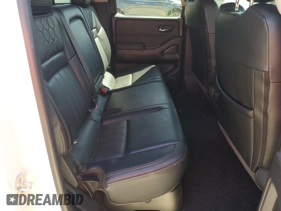 2023 Nissan Frontier Pro-X with VIN 1N6ED1EJ1PN672564, listed as a Copart auction lot 49304865 with 13,575 mi miles and Salvage title. Bid and sale history available at DreamBid. Image 10.