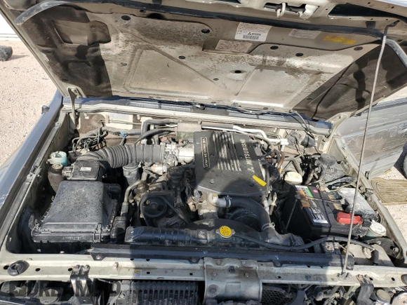 1998 Mitsubishi Montero z VIN JA4MR51R0WJ000921, wystawiony jako Copart lot #56250965 z przebiegiem 181 293 mil mil oraz Szkoda całkowita • Salvage title. Historia ofert i sprzedaży dostępna na DreamBid. Obrazek 12.