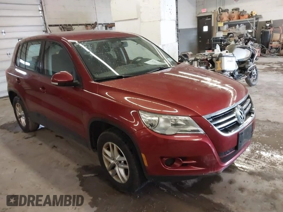 2011 Volkswagen Tiguan SE with VIN WVGBV7AX9BW000461, listed as a IAAI auction lot 42032028 with 149,896 mi miles and . Bid and sale history available at DreamBid. Image 1.