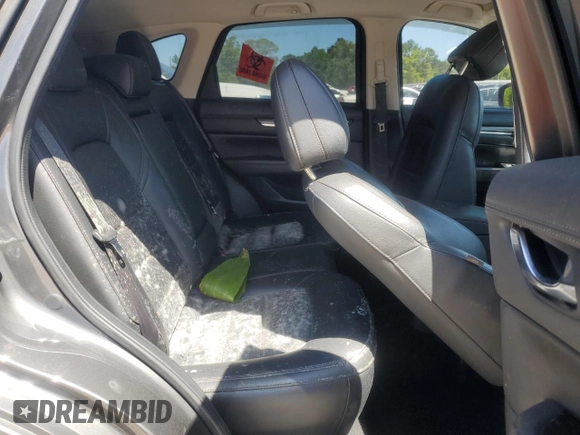 2018 Mazda CX-5 Grand Touring with VIN JM3KFADM9J0343621, listed as a Copart auction lot 52284475 with 129,776 mi miles and Salvage Title. Bid and sale history available at DreamBid. Image 11.