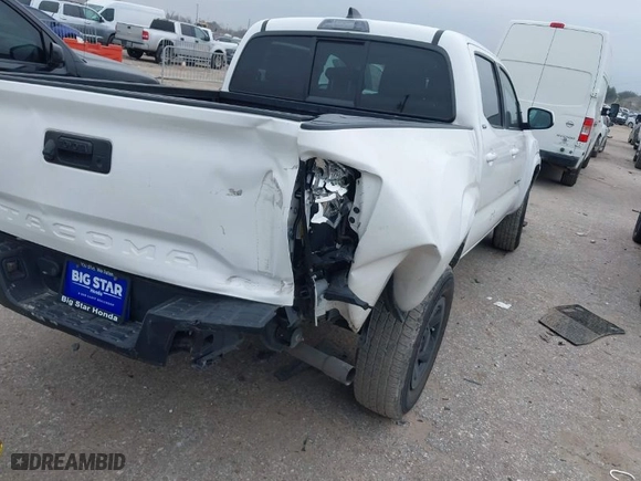 2023 Toyota Tacoma 2WD SR with VIN 3TYAX5GN0PT068597, listed as a IAAI auction lot 41603109 with 33,279 mi miles. Bid and sale history available at carsss.com. Image 6.