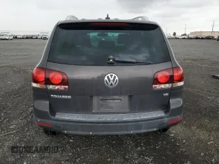 2008 Volkswagen Touareg V6 z VIN WVGBE77LX8D000610, wystawiony jako Copart lot #58434065 z przebiegiem 208 718 mil mil oraz Czysty tytuł • Clean title. Historia ofert i sprzedaży dostępna na DreamBid. Obrazek 6.