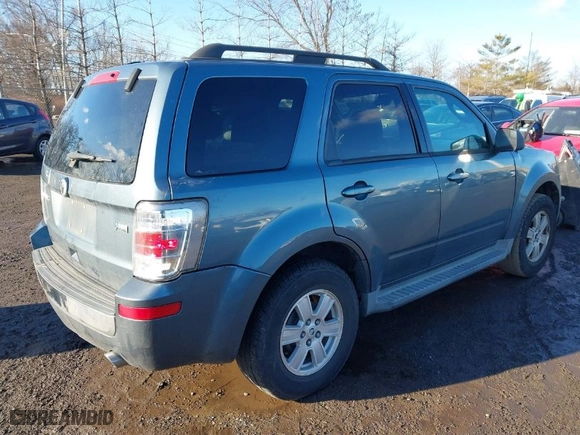 2010 Mercury Mariner with VIN 4M2CN9BG0AKJ02637, listed as a IAAI auction lot 41579241 with 128,095 mi miles. Bid and sale history available at carsss.com. Image 4.