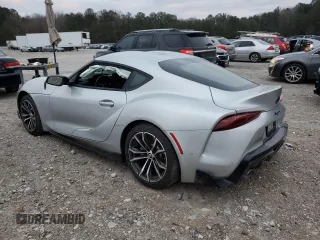 2022 Toyota GR Supra 2.0 with VIN WZ1DB2C09NW048380, listed as a Copart auction lot 87413024 with 0 mi miles and Salvage Title. Bid and sale history available at carsss.com. Image 2.
