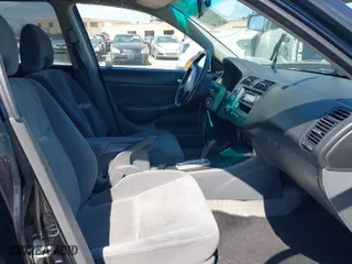 2005 Honda Civic Sdn EX with VIN 2HGES26765H550047, listed as a IAAI auction lot 41895885 with 258,553 mi miles. Bid and sale history available at carsss.com. Image 5.