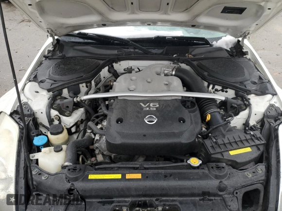 2006 Nissan 350Z Touring z VIN JN1AZ36A86M451791, wystawiony jako Copart lot #45200125 z przebiegiem 85 159 mil mil oraz Szkoda całkowita • Salvage title. Historia ofert i sprzedaży dostępna na DreamBid. Obrazek 11.