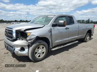 2012 Toyota Tundra 4WD Truck with VIN 5TFCY5F15CX013941, listed as a Copart auction lot 69946754 with 163,228 mi miles and Salvage Title. Bid and sale history available at carsss.com. Image 1.
