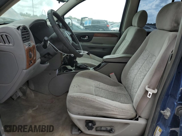 2006 Isuzu Ascender S z VIN 4NUDS13S062700570, wystawiony jako Copart lot #54920305 z przebiegiem 158 263 mil mil oraz Szkoda całkowita • Salvage title. Historia ofert i sprzedaży dostępna na DreamBid. Obrazek 7.