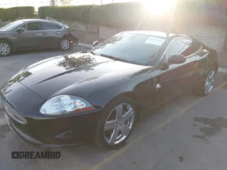2008 Jaguar XK with VIN SAJWA43B985B23987, listed as a IAAI auction lot 41197091 with 54,803 mi miles. Bid and sale history available at carsss.com. Image 2.