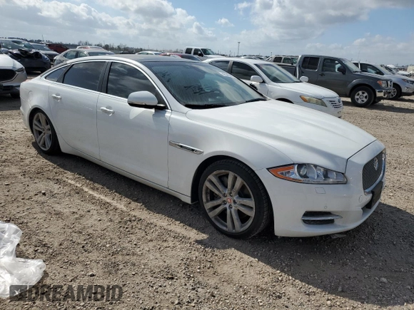 2014 Jaguar XJ with VIN SAJWA2GZ3E8V70365, listed as a Copart auction lot 42545995 with 65,649 mi miles and Salvage Title. Bid and sale history available at carsss.com. Image 4.