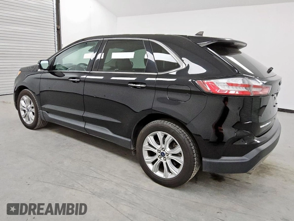 2021 Ford Edge Titanium с VIN 2FMPK4K94MBA27083, выставлен на аукционе Copart как лот 62149285 с пробегом 128 325 миль миль и Чистый • Clean title. История ставок и продаж доступна на DreamBid. Изображение 2.