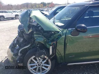 2016 MINI Countryman S z VIN WMWZC5C50GWU03242, wystawiony jako IAAI lot #41912462 z przebiegiem 68 477 mil mil oraz . Historia ofert i sprzedaży dostępna na DreamBid. Obrazek 18.