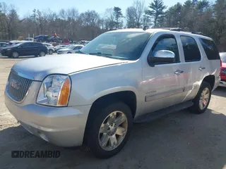 2011 GMC Yukon SLT with VIN 1GKS2CE01BR186874, listed as a IAAI auction lot 41762705 with 249,283 mi miles. Bid and sale history available at carsss.com. Image 2.