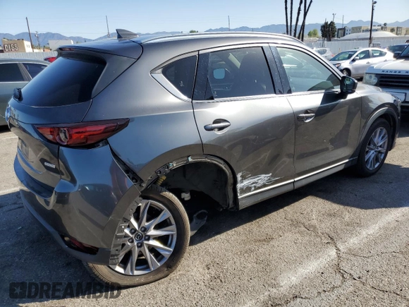 2019 Mazda CX-5 Grand Touring with VIN JM3KFADM2K0665356, listed as a Copart auction lot 51886685 with 44,760 mi miles and Salvage Title. Bid and sale history available at carsss.com. Image 3.