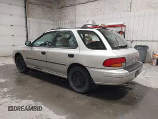 1999 Subaru Impreza L with VIN JF1GF4357XH811307, listed as a IAAI auction lot 41505426 with 195,693 mi miles and . Bid and sale history available at DreamBid. Image 3.