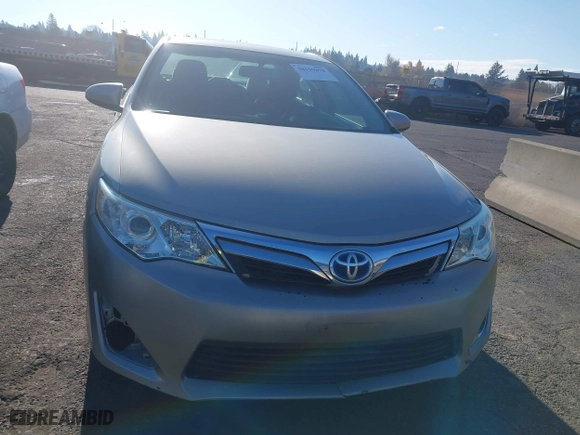 2014 Toyota Camry Hybrid LE with VIN 4T1BD1FK8EU097505, listed as a IAAI auction lot 38159878 with 379,573 mi miles. Bid and sale history available at carsss.com. Image 6.