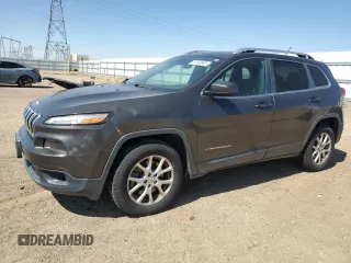 2015 Jeep Cherokee Latitude z VIN 1C4PJMCB2FW734385, wystawiony jako Copart lot #57333805 z przebiegiem 121 249 mil mil oraz Szkoda całkowita • Salvage title. Historia ofert i sprzedaży dostępna na DreamBid. Obrazek 1.