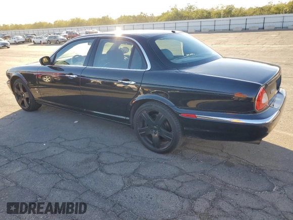 2006 Jaguar XJ with VIN SAJWA73C26TH03133, listed as a Copart auction lot 81796674 with 128,006 mi miles and Non repairable. Bid and sale history available at DreamBid. Image 2.