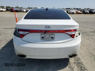 2013 Hyundai Azera z VIN KMHFH4JG9DA209562, wystawiony jako Copart lot #59808655 z przebiegiem 130 994 mil mil oraz Szkoda całkowita • Salvage title. Historia ofert i sprzedaży dostępna na DreamBid. Obrazek 6.