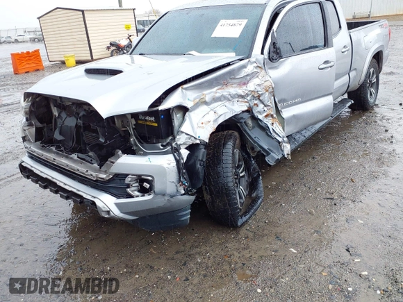 2017 Toyota Tacoma SR5 with VIN 5TFDZ5BN6HX025338, listed as a IAAI auction lot 41754879 with Not provided miles and . Bid and sale history available at DreamBid. Image 6.