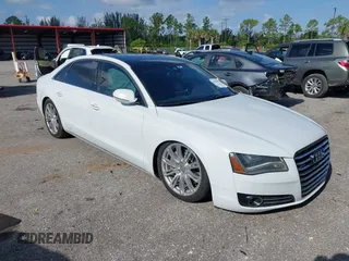 2014 Audi A8 4.0T with VIN WAUR2AFD8EN004371, listed as a IAAI auction lot 42693492 with 159,405 mi miles and . Bid and sale history available at DreamBid. Image 1.