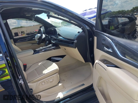 2023 Cadillac Escalade 4WD Premium Luxury with VIN 1GYS4BKL4PR236070, listed as a IAAI auction lot 41905971 with 40,382 mi miles and . Bid and sale history available at DreamBid. Image 5.