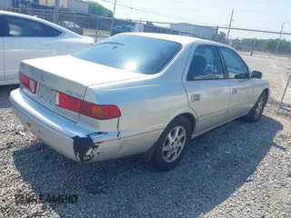 2001 Toyota Camry CE with VIN 4T1BG22K11U805882, listed as a IAAI auction lot 42576999 with 300,777 mi miles and . Bid and sale history available at DreamBid. Image 4.