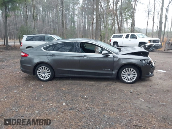 2016 Ford Fusion SE Hybrid with VIN 3FA6P0LU2GR388787, listed as a IAAI auction lot 41733661 with 86,078 mi miles and . Bid and sale history available at DreamBid. Image 13.