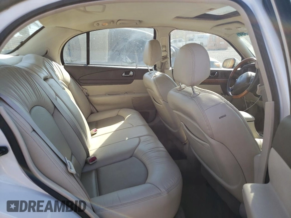 2002 Lincoln Continental with VIN 1LNHM97V62Y643532, listed as a Copart auction lot 76015984 with 154,374 mi miles and Salvage Title. Bid and sale history available at carsss.com. Image 10.