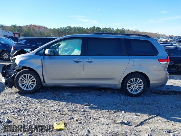2011 Toyota Sienna XLE AAS with VIN 5TDYK3DC9BS103193, listed as a IAAI auction lot 41073036 with 175,474 mi miles and . Bid and sale history available at DreamBid. Image 14.