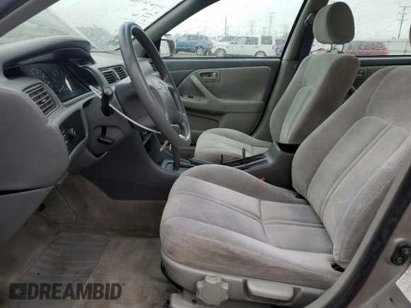 1997 Toyota Camry LE z VIN 4T1BG22K6VU106916, wystawiony jako Copart lot #56707935 z przebiegiem 235 517 mil mil oraz Szkoda całkowita • Salvage title. Historia ofert i sprzedaży dostępna na DreamBid. Obrazek 7.