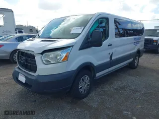 2016 Ford Transit Wagon XL with VIN 1FBZX2ZM5GKB32047, listed as a IAAI auction lot 41710159 with 321,489 mi miles. Bid and sale history available at carsss.com. Image 17.