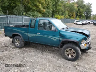 1997 Nissan Frontier XE with VIN 1N6SD16Y0VC329686, listed as a Copart auction lot 73103584 with 105,657 mi miles and Salvage title. Bid and sale history available at DreamBid. Image 4.