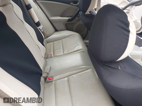 2009 Acura TSX z VIN JH4CU26669C012821, wystawiony jako IAAI lot #42651846 z przebiegiem 234 419 mil mil oraz . Historia ofert i sprzedaży dostępna na DreamBid. Obrazek 8.