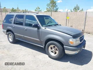 1999 Ford Explorer XLT z VIN 1FMDU34E1XZA35628, wystawiony jako IAAI lot #42103849 z przebiegiem 297 521 mil mil oraz . Historia ofert i sprzedaży dostępna na DreamBid. Obrazek 1.