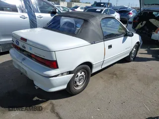 1992 Geo Metro z VIN JG1MR3364NK213871, wystawiony jako IAAI lot #41719350 z przebiegiem 22 589 mil mil oraz . Historia ofert i sprzedaży dostępna na DreamBid. Obrazek 4.