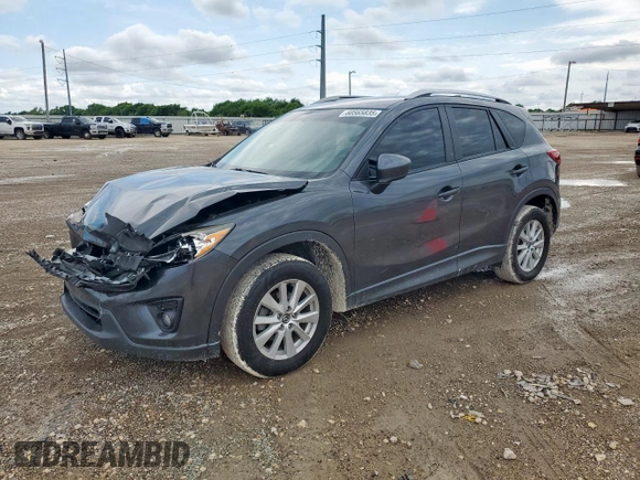 2014 Mazda CX-5 Touring z VIN JM3KE2CY7E0308580, wystawiony jako Copart lot #60565835 z przebiegiem 92 708 mil mil oraz Szkoda całkowita • Salvage title. Historia ofert i sprzedaży dostępna na DreamBid. Obrazek 1.