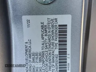 2023 Honda Civic Sport z VIN 19XFL2H80PE001402, wystawiony jako Copart lot #52409015 z przebiegiem 16 079 mil mil oraz Szkoda całkowita • Salvage title. Historia ofert i sprzedaży dostępna na DreamBid. Obrazek 12.