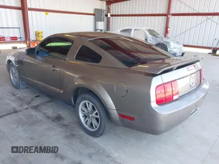 2005 Ford Mustang Deluxe with VIN 1ZVFT80N155128766, listed as a IAAI auction lot 41667434 with 233,175 mi miles. Bid and sale history available at carsss.com. Image 3.