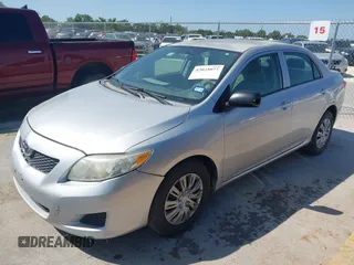 2009 Toyota Corolla with VIN 1NXBU40E79Z134599, listed as a IAAI auction lot 42035077 with 154,051 mi miles. Bid and sale history available at carsss.com. Image 2.