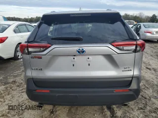 2023 Toyota RAV4 Hybrid XLE Premium z VIN JTMB6RFV8PD115723, wystawiony jako Copart lot #88005175 z przebiegiem 18 363 mil mil oraz Szkoda całkowita • Salvage title. Historia ofert i sprzedaży dostępna na DreamBid. Obrazek 6.