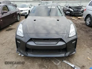 2017 Nissan GT-R Premium z VIN JN1AR5EF8HM820659, wystawiony jako Copart lot #41607974 z przebiegiem Nie podano mil oraz Szkody całkowita. Historia ofert i sprzedaży dostępna na DreamBid. Obrazek 5.