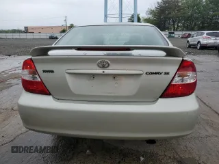 2004 Toyota Camry LE z VIN JTDBE32K940297754, wystawiony jako Copart lot #55809155 z przebiegiem 232 092 mil mil oraz Szkoda całkowita • Salvage title. Historia ofert i sprzedaży dostępna na DreamBid. Obrazek 6.